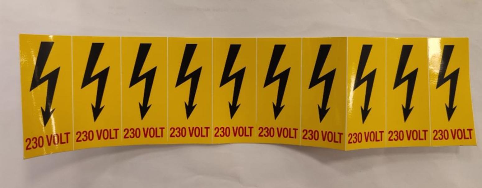 Etichetta adesiva Cartelli Segnalatori 230V simbolo zagaglia- E91512B 01